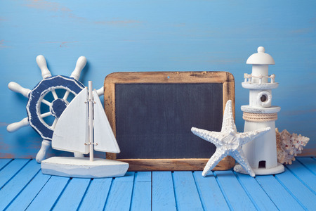 Summer holiday background with chalkboard and decorations. Copy space for textの写真素材