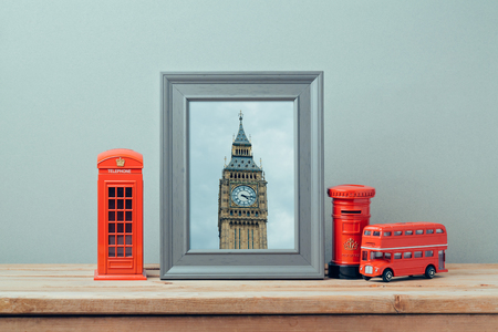 Poster mock up template with London telephone booth and Big Ben Tower. Travel and tourism concept.の写真素材