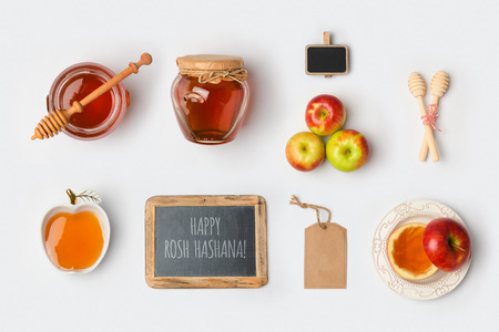 Jewish holiday Rosh Hashana mock up template with honey and apples. View from above. Flat layの写真素材