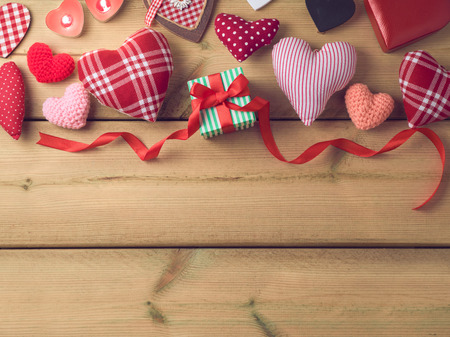 Valentines day background with heart shapes and gift box. Top viewの写真素材