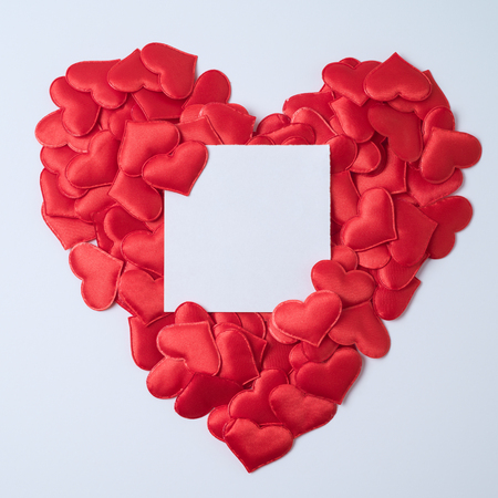 Heart shape with paper note on white background. Valentines day conceptの写真素材