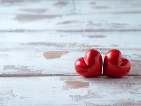Valentines day background with heart shape on wooden boardの写真素材