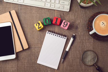 2019 new year plan concept with notepad. Workplace  background. View from aboveの写真素材