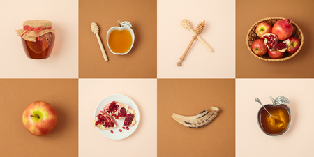 Jewish holiday Rosh Hashanah concept with honey, apple and pomegranate. View from above. Flat layの写真素材