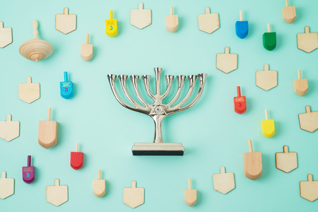 Jewish holiday Hanukkah background with menorah and spinning top. Top view from above. Flat layの写真素材