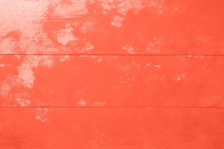 Living coral color wooden board background textureの写真素材
