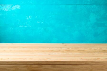 Empty wooden table over blue wooden  background.の写真素材