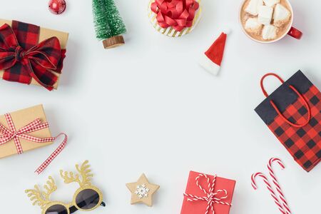 Christmas holiday background with gift boxes, chocolate cup and decorations. Top view from above. Flat layの写真素材