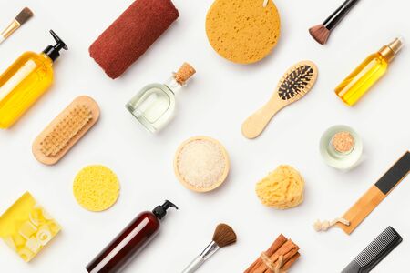Spa and beauty treatment products isolated on white background. Top view from above