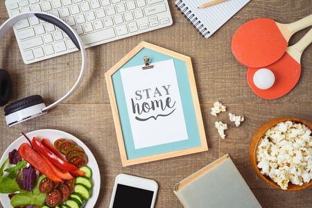 Stay at home concept for social media awareness and coronavirus prevention. Doing different activities at home concept.の写真素材