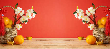 Festive backgroind for Chinese New Year celebration with wooden table