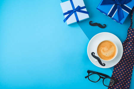 Happy Fathers day greeting card with coffee cup,  necktie and gift box. Flat lay, top viewの写真素材