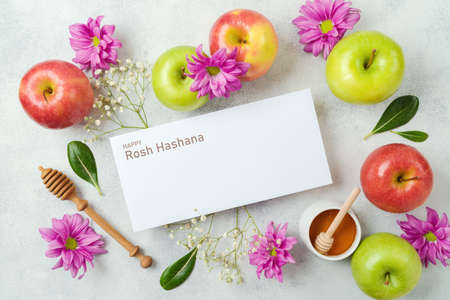 Greeting card mock up for Jewish holiday Rosh Hashana. Top view background with apples and honey. Flat layの写真素材