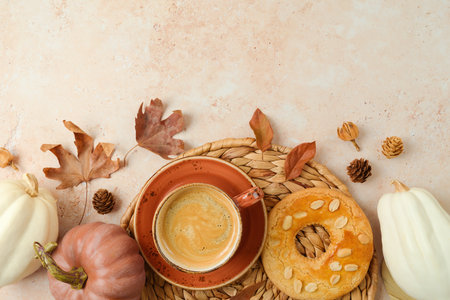 Autumn season concept  with coffee cup, cookie and white pumpkin on stone background. Top view, flat layの写真素材
