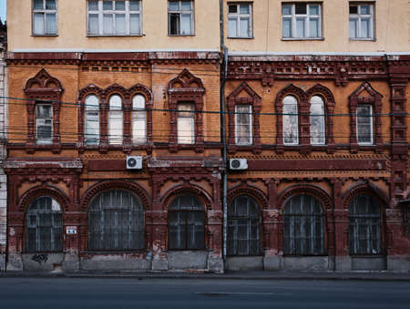 An ancient building in the center of a modern city