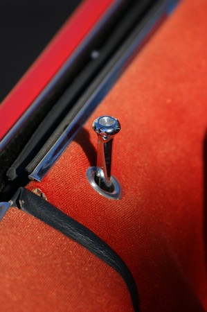 A shiny chrome plunger on a restored classic carの写真素材