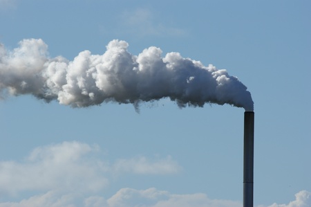 Smoke coming out of factory chimneyの写真素材