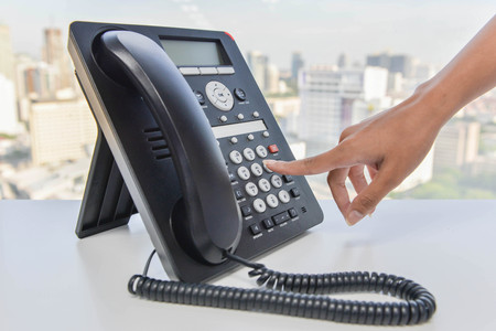 Press the telephone button panel to Dial-upの写真素材
