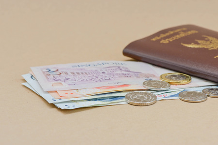 Thailand Passport and Singapore moneyの写真素材