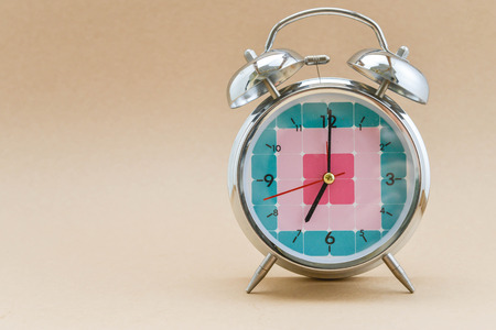 Alarm clock is showing time for 7 AMの写真素材