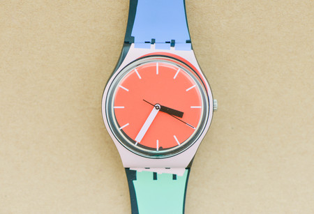Beauty woman watch on the brown background