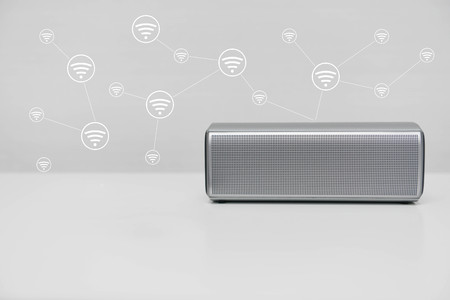 Mobile phone connected with the Mobile speakerの写真素材