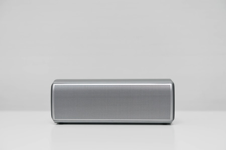 Mobile speaker on the white screenの写真素材