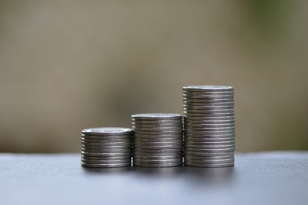 Growing coins stacks for concept of saving moneyの写真素材