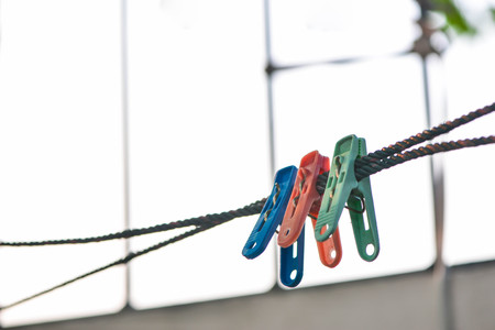 Clothespin on a clothes lineの写真素材