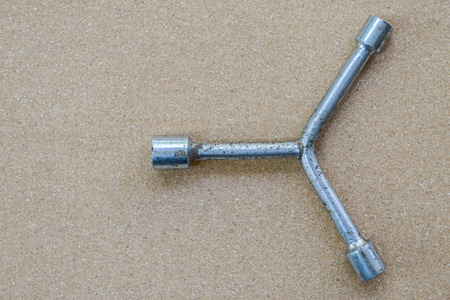 Three head wrench on the brown backgroundの写真素材