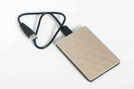 External hard disk on the white screen isolatedの写真素材