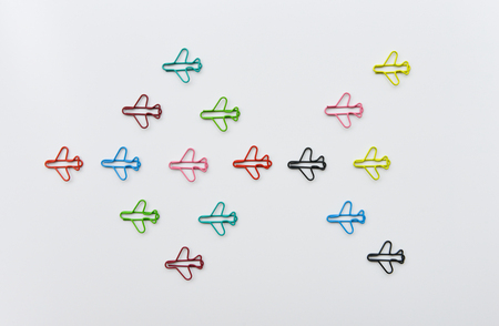 Group of plane paper clip point to same direction for business team work conceptの写真素材