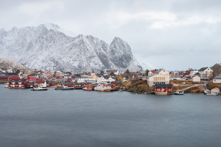 Fishing house village among the snow with mountain view in Lofoten island Reine Norwayのeditorial素材