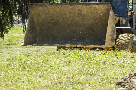 Photos of industrial heavy machinery during the construction of a local road in Bosnia and Herzegovina.の写真素材