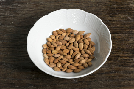 Photographed apricot seeds in sunlight.の写真素材