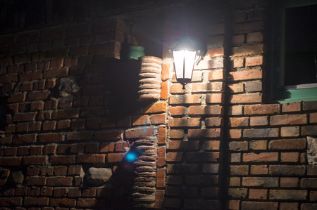 Lamp on a brick wall.の写真素材