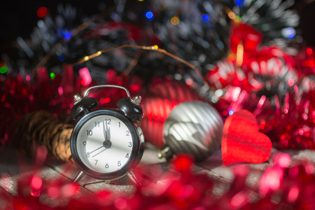 Vintage clock and decoration on a wooden table.の写真素材