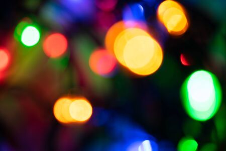 background image, colored round lights in the dark, for Christmas cards and greetings. Degradationの写真素材