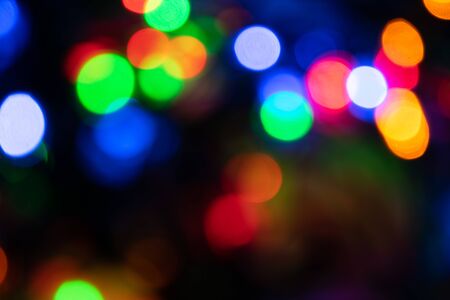 background image, colored round lights in the dark, for Christmas cards and greetings. Degradationの写真素材