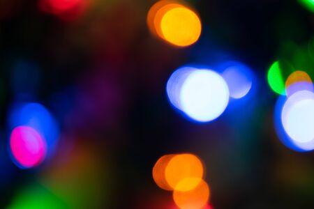 background image, colored lights in the darkの写真素材