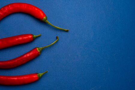 peppers, Cayenne red burning in front of Chile, close-upの写真素材