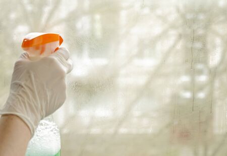 universal detergents for the home, the concept of cleanliness and cleaning in the apartment, sitting at homeの写真素材
