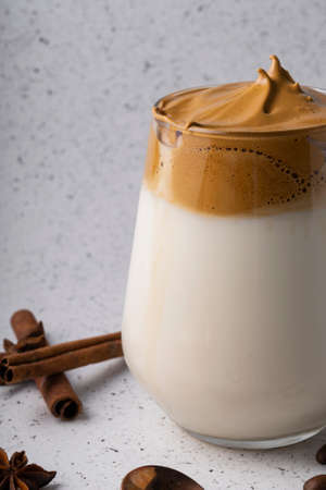 selective focus, Korean drink, dalgona coffee. with cold milk, sweet strong foam with sugarの写真素材