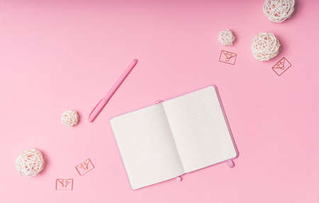 selective focus. Valentine's day layout. pink notepad with copyspace. on a pink paper background...