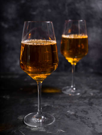 amber or orange wine made from white grapes. in a tall wine glass. Georgian national wine according...