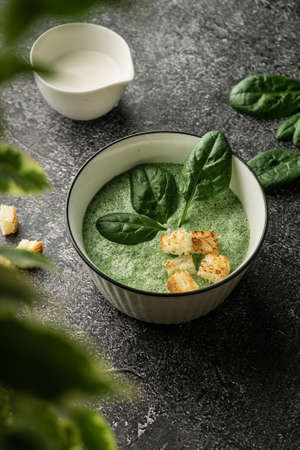 selective focus. cream soup of spinach