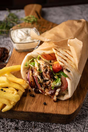 selective focus. doner kebab, a shawarma in a pitの写真素材