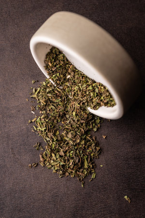 selective focus, natural green leaf tea in a clay bowlの写真素材