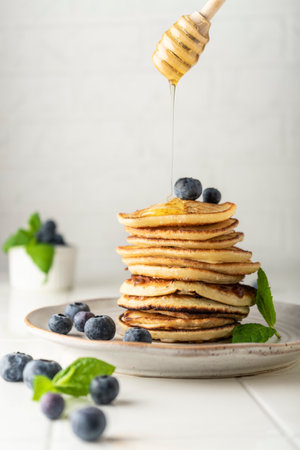 sweet pancakes for breakfast in a stackの写真素材