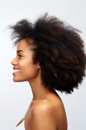 Beautiful african american young woman with afro hairstyleの素材